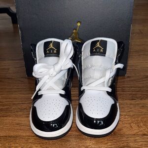 Kids Jordan Black and White Sneakers